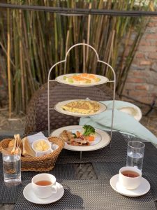 View larger photo: Breakfast foods and cups of coffee on a table