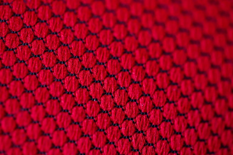 Red nylon pattern (macro focus of a red textile)