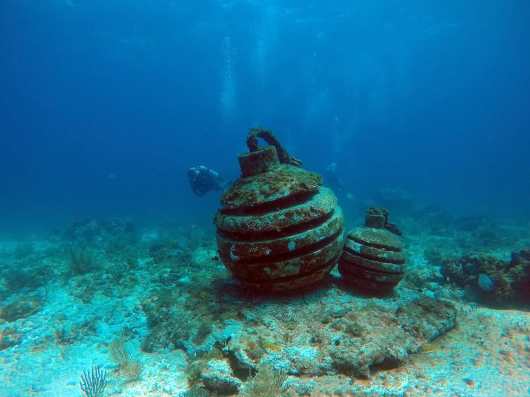 A sculpture from the underwater museum in Cancún, Mexico