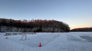 Early morning view of broomball and curling courts on the frozen beachfront of Little Elkhart Lake at Camp Anokijig (Plymouth, Wisconsin)

