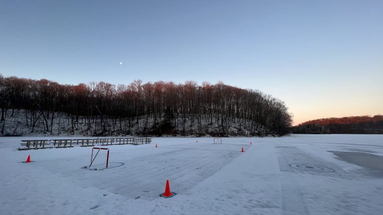 Early morning view of broomball and curling courts on the frozen beachfront of Little Elkhart Lake at Camp Anokijig (Plymouth, Wisconsin)