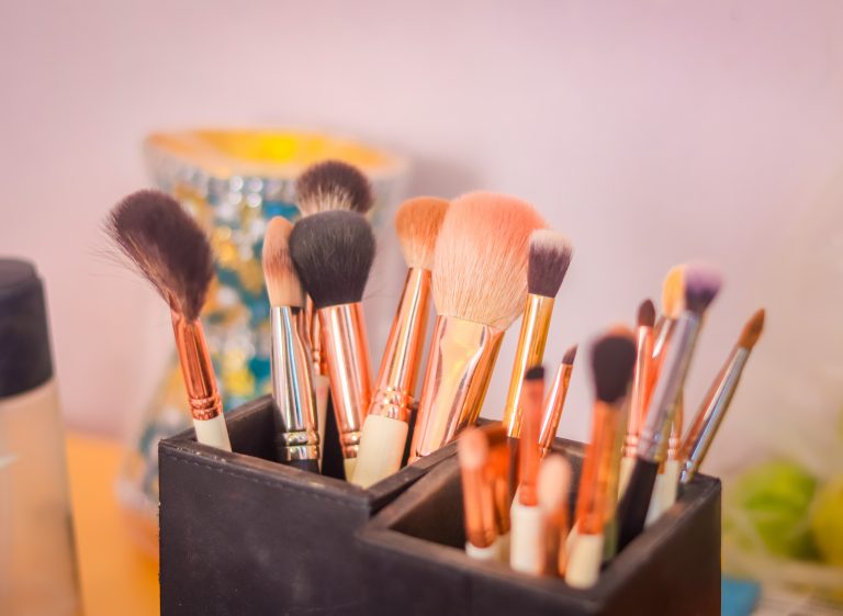 Tools of transformation: Explore the enchanting array of makeup brushes nestled in this sophisticated makeup kit, each one holding the promise of enhancing beauty.