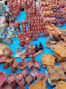 Trinkets, clay mugs, and statuary for sale in Bankura, West Bengal, India