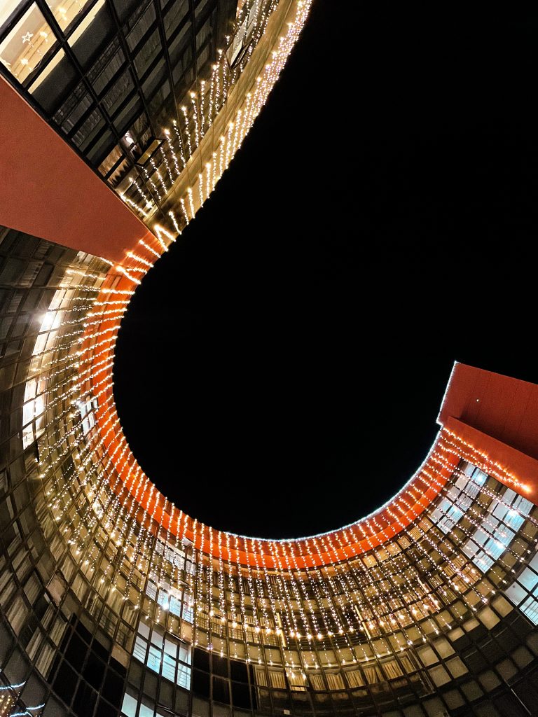 A building lit up at night using LED lights.