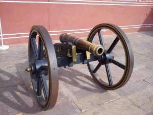 A photo of a cannon preserved in a museum in Jaipur, showcasing the city's rich history and heritage