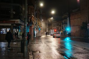 Hazy street before the break of dawn in Sevilla, Spain