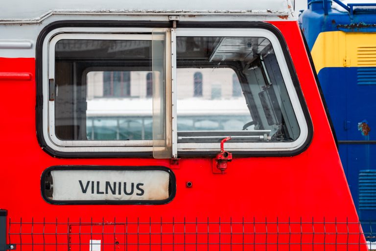 “Vilnius” written on an old red train.