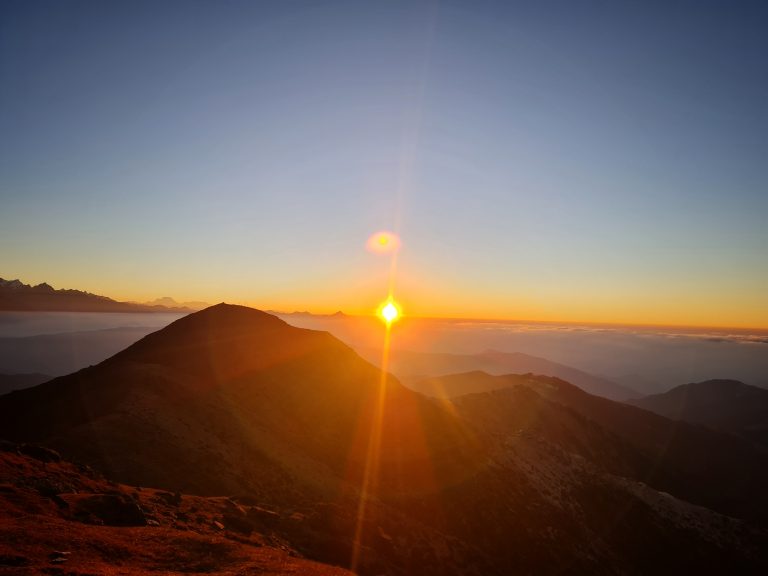 Golden rays of the sunrise seen from Peaky Peak.