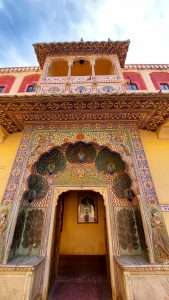 The peacock entrance gates in The City Palace are beautifully crafted with rock and marble and the walls are painted with various flowers in various colors. The City Palace is a famous tourist destination in Jaipur, Rajasthan, India
