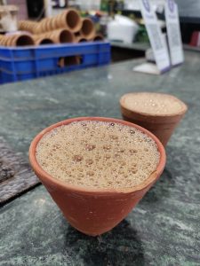 Frothy tea served in a clay cup in Kolkata.