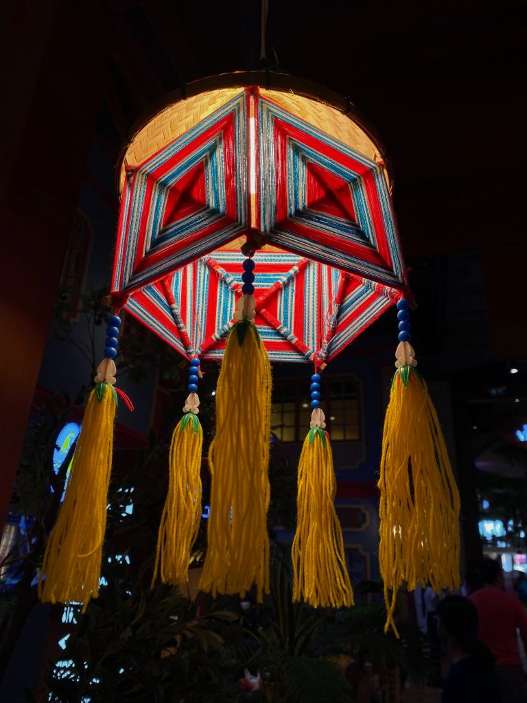 A beautiful lantern casting a warm glow in the night