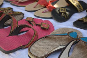 Colorful handmade slippers made of jute in a village of Udaipur.