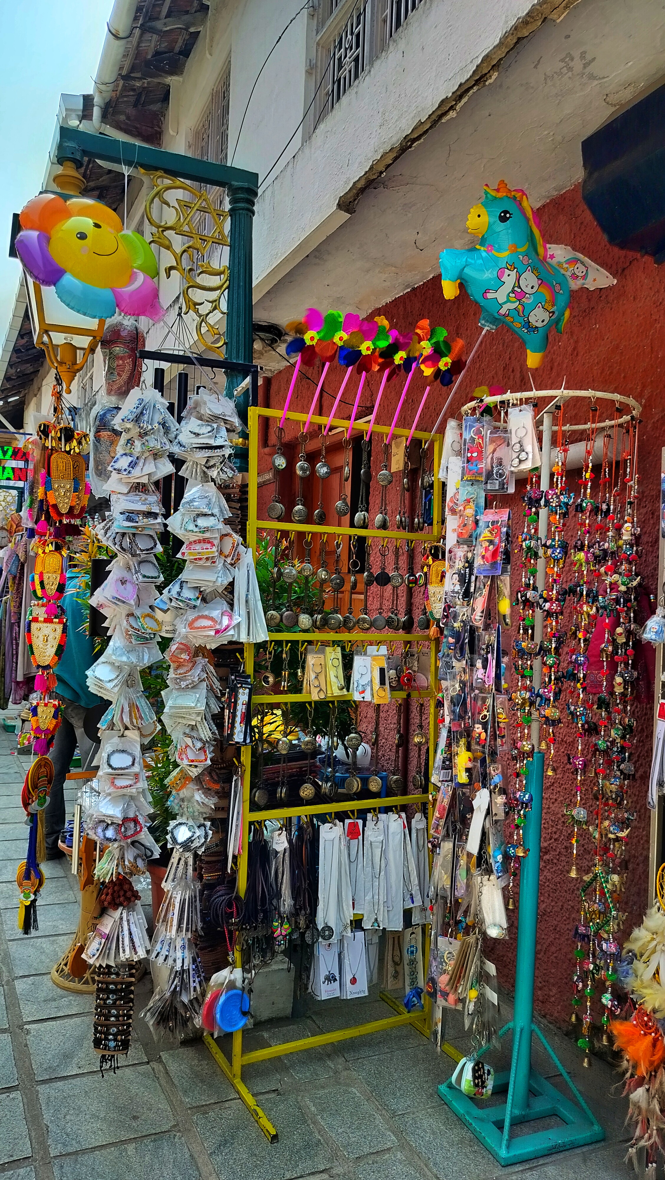 Finding beauty in the ordinary streets. A street stall with verity of ornaments and toys.