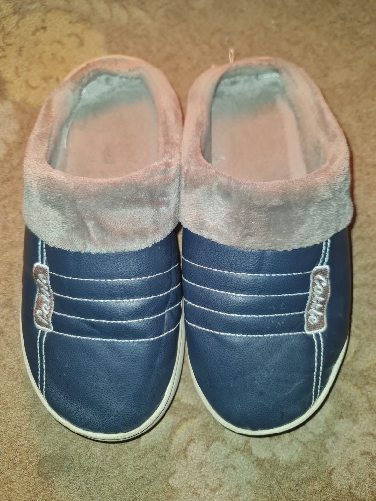 Unisex winter slippers crafted from cotton fabric in a combination of blue and gray hues.