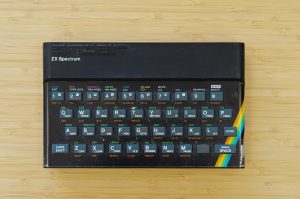 ZX spectrum 48K sitting on a wooden table