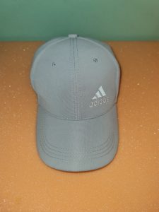 Gray ball cap.