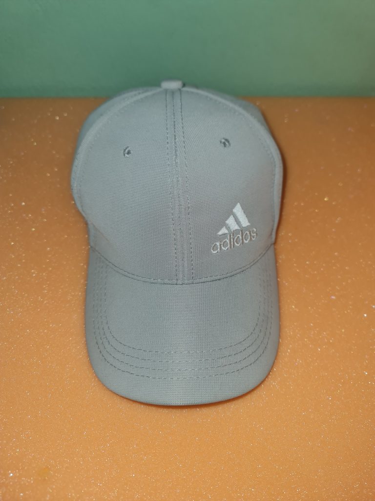 Gray ball cap.