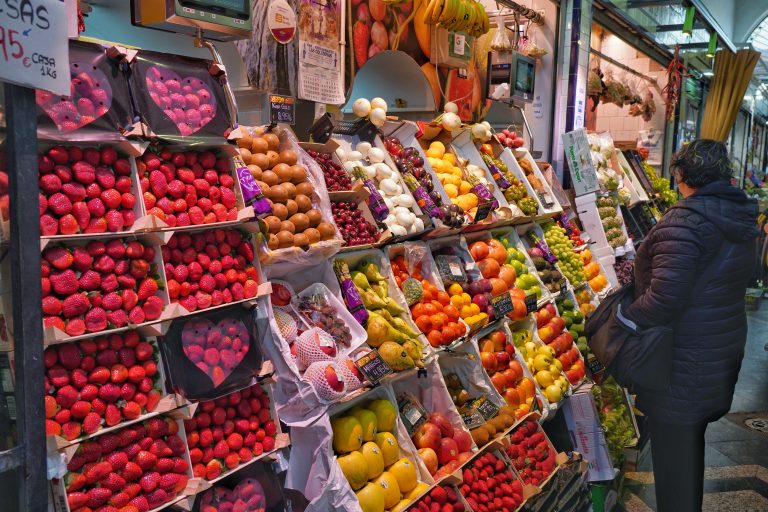 Woman buying fruit at a local market