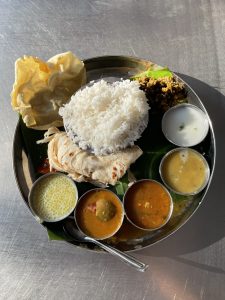 South Indian Thali Plate: Culinary delight, a vibrant assortment of regional flavors, an authentic feast captured.
