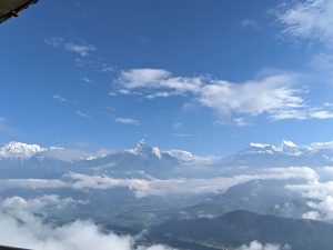  A breathtaking aerial view of the majestic mountain range at Sarangkot View Point, Pokhara, Nepal.
