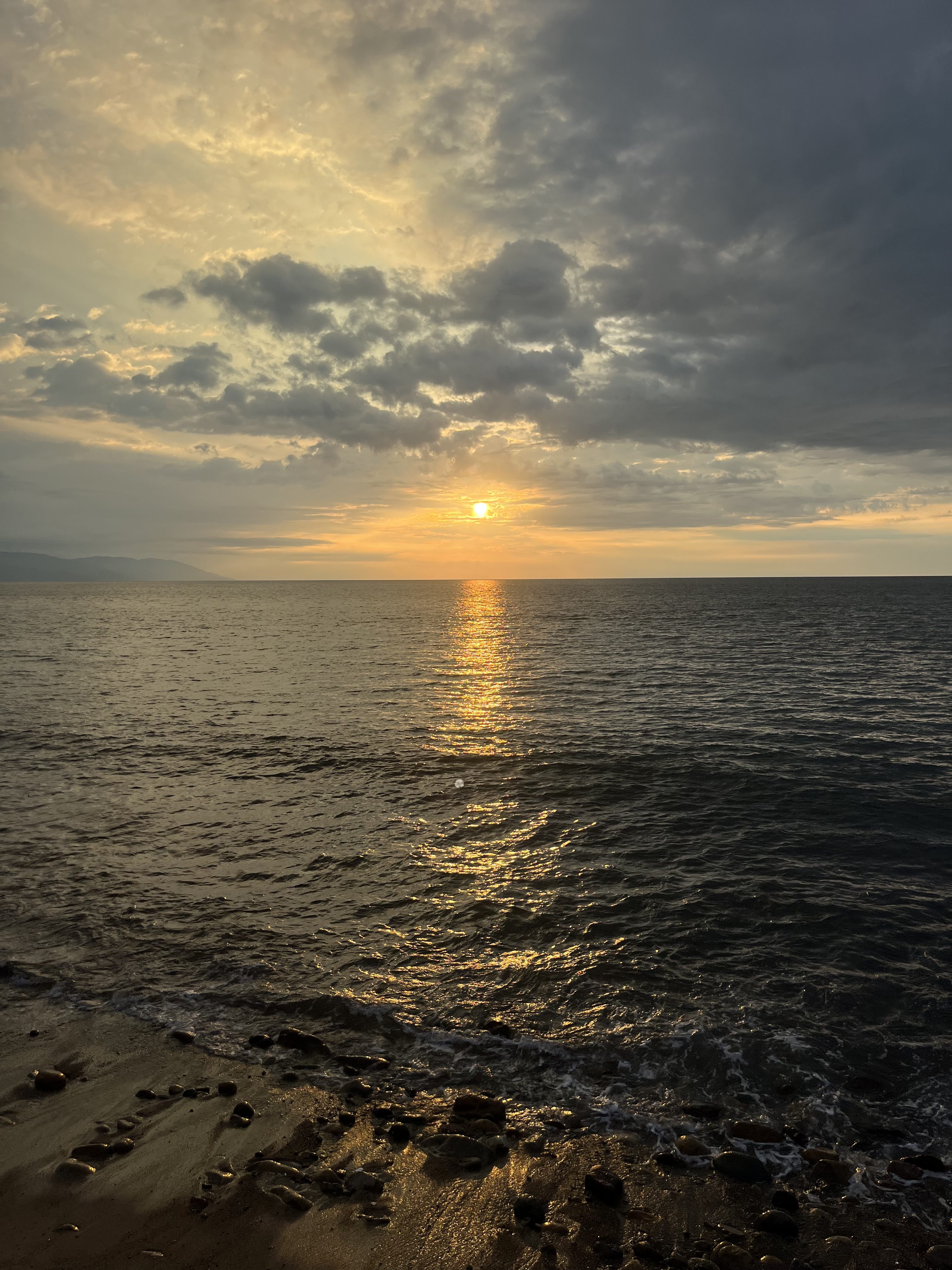 Puerto Vallarta Beach Sunset: Tranquil horizon, vibrant hues, serene beauty captured on the Mexican coastline.