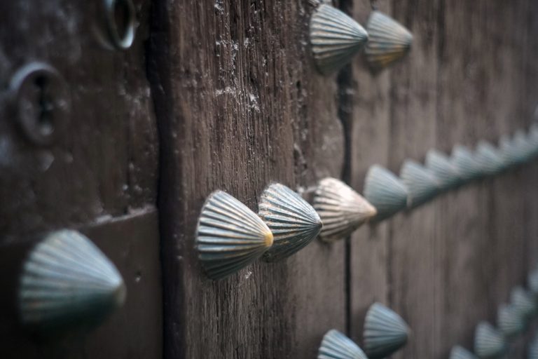 Old wooden door with iron studs