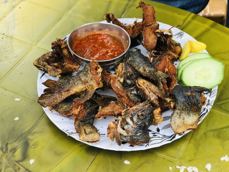 Fried trout fish with spicy sauce