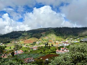 A picturesque village nestled under a vast blue sky