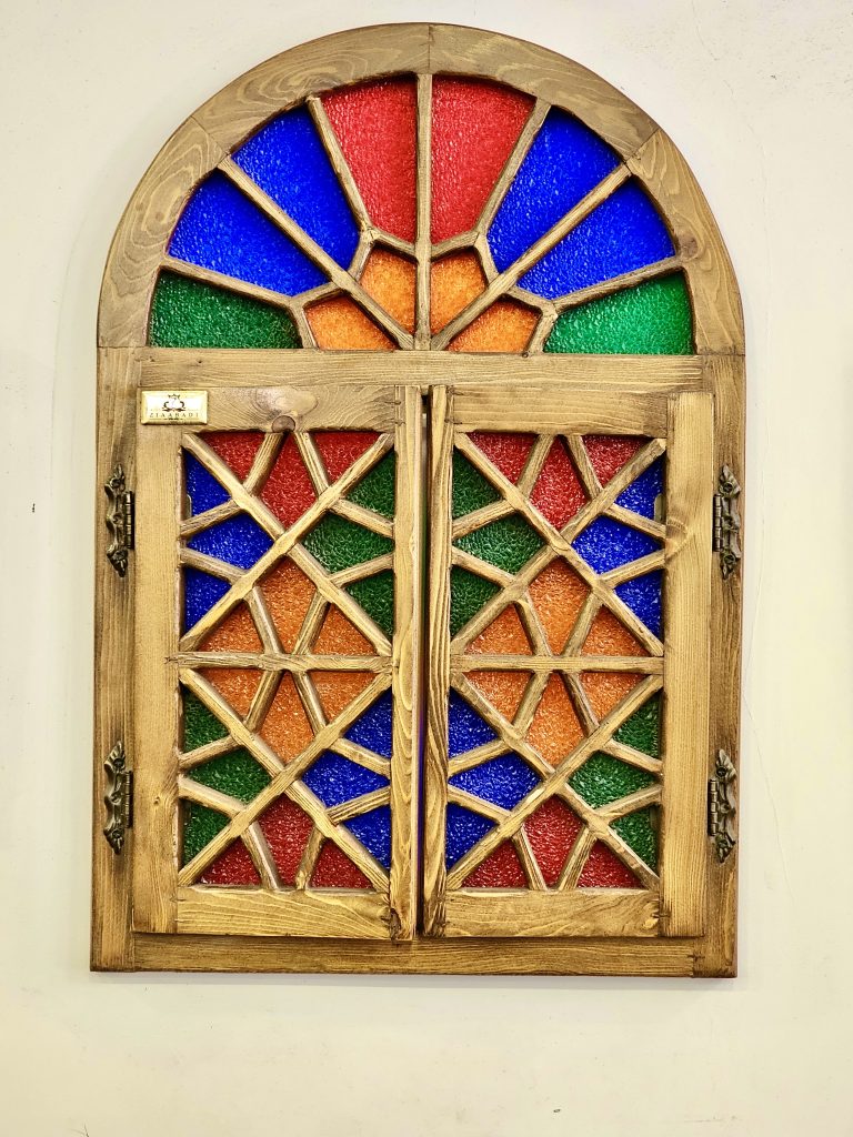 A traditional and colourful window’s miniature as a wall decoration. From Irani Cafe, Pune, Maharashtra.