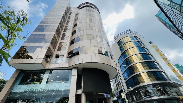 Skyscraper buildings constructed with glass and tiles in a modern style.