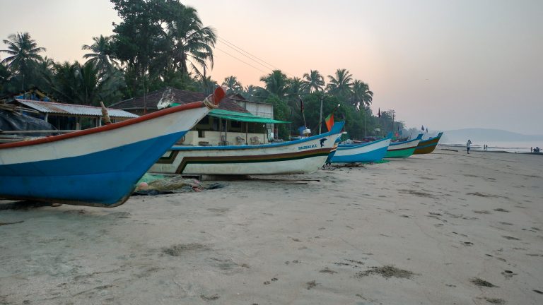 Fishing boats are parked on beach side. Sunrise morning at Devbag beach, malvan.