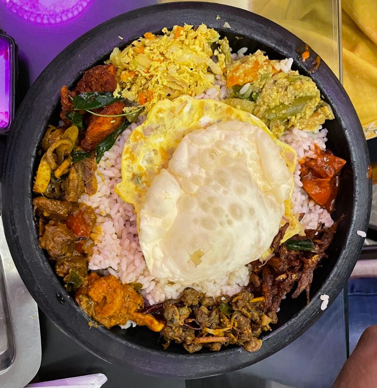 ‘Chatti Choru’ Kerala meals served in a pot(Chatti) with all veg and non veg dishes.