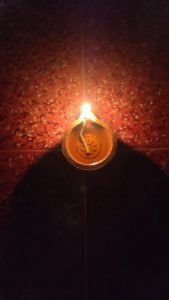 A Diya illuminating a night during the festival of Diwali.