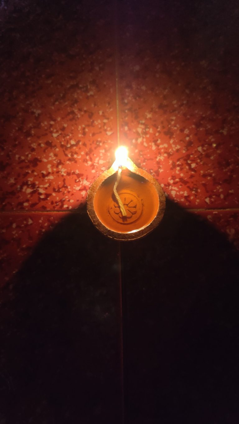 A Diya illuminating a night during the festival of Diwali.