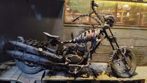 Motorcycle model welded from scrap metal pieces and parts.