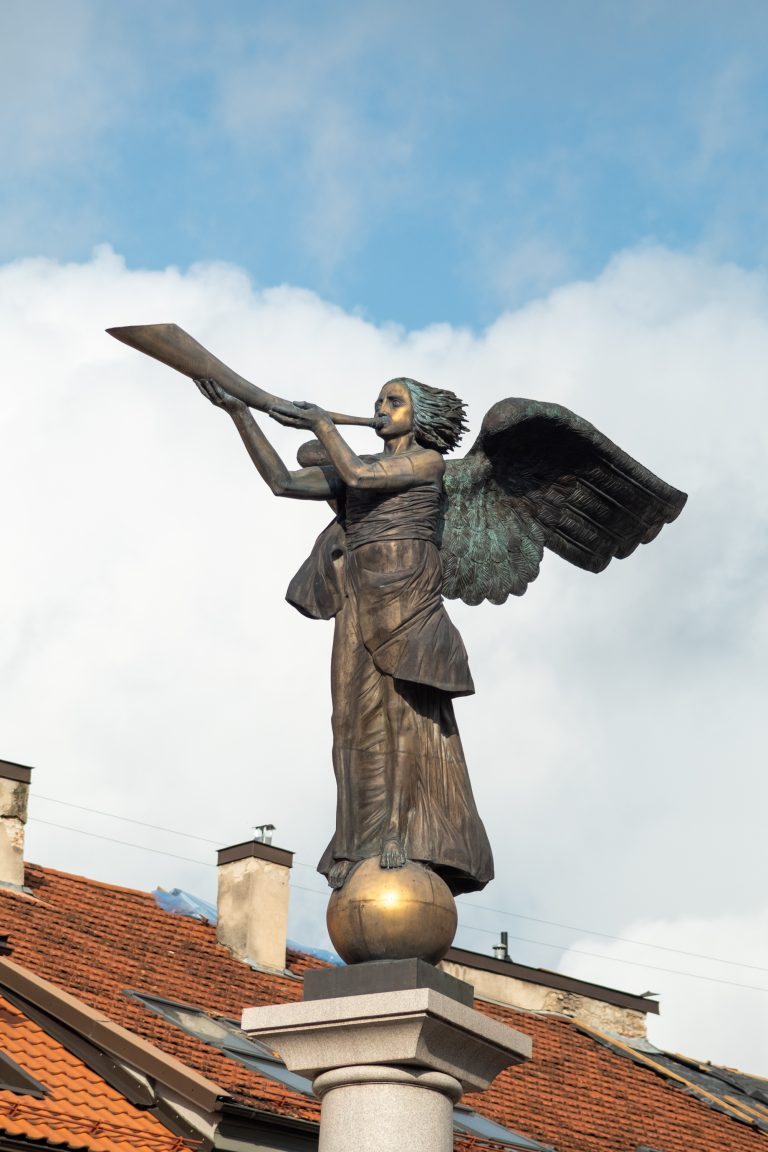 The Angel of U?upis statue in Vilnius on a sunny day.