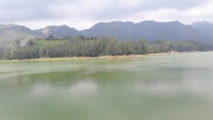 A long view of a lake and hills. 