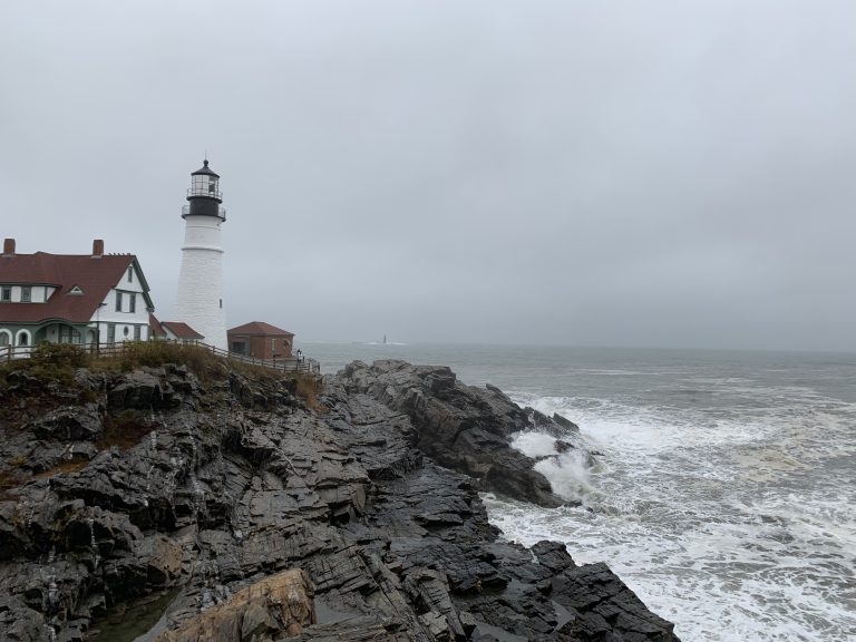 The Portland Head Light in Fort Williams Park, Cape Elizabeth, Maine on a dark, dreary day.