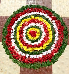 View larger photo: onam pookalam is an intricate and colorful flower arrangement on the floor. Traditionally decorating Pookalam is extremely popular in Kerala and is followed as a ritual in every household during ten-day-long Onam celebrations.