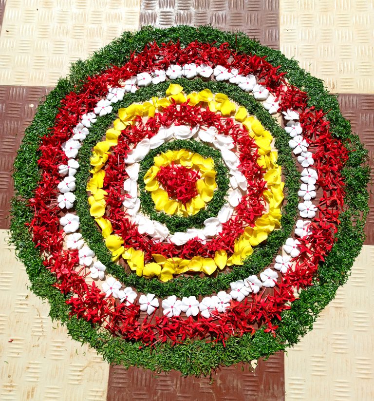 onam pookalam is an intricate and colorful flower arrangement on the floor. Traditionally decorating Pookalam is extremely popular in Kerala and is followed as a ritual in every household during ten-day-long Onam celebrations.