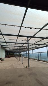 An empty Balcony with glass roofing