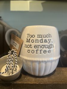 Ceramic coffee cup with the text “Too much Monday, not enough coffee”
