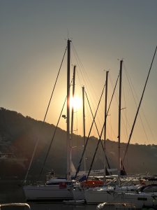 Sunrise in the small port of Syvota, Greece. Boats can be seen in the dim light.