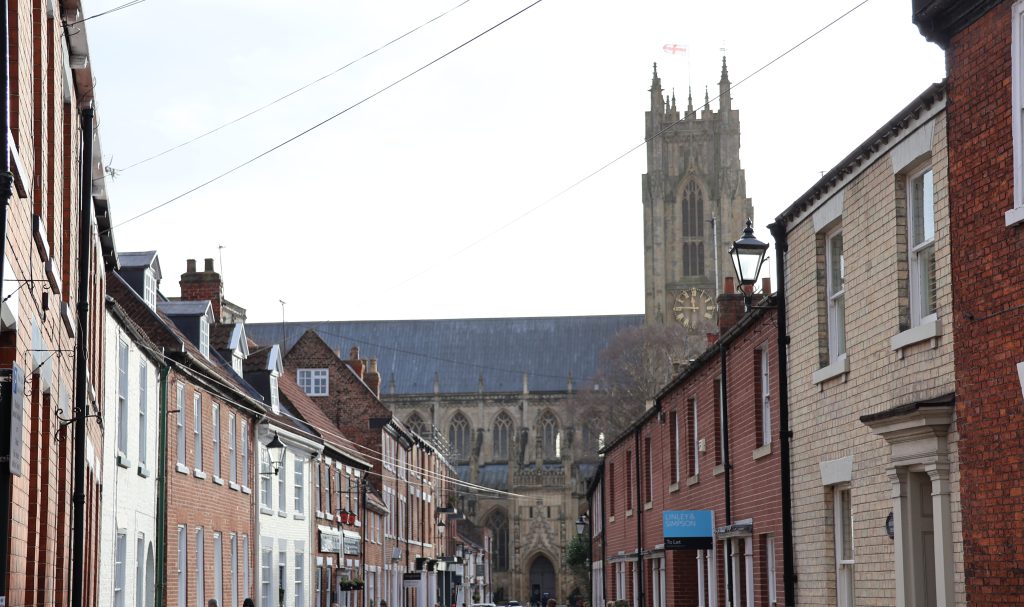 Beverley Minster in the background with Georgian houses in the foreground.