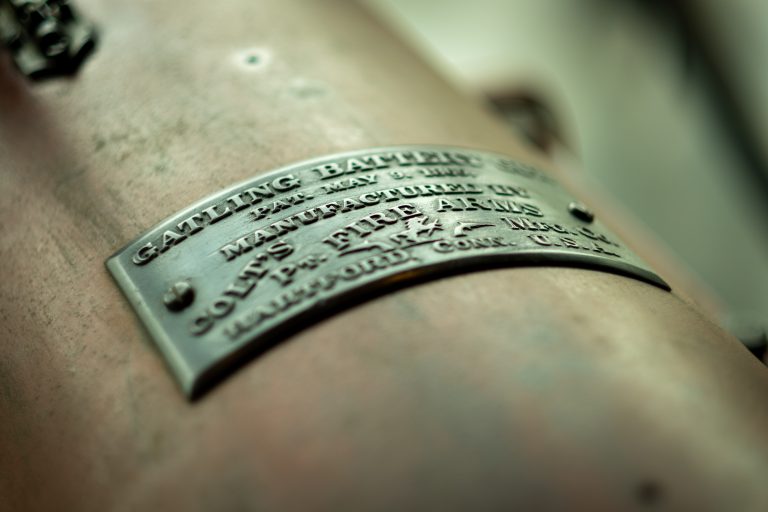 Manufacturer plate on a historic Gatling machine gun.