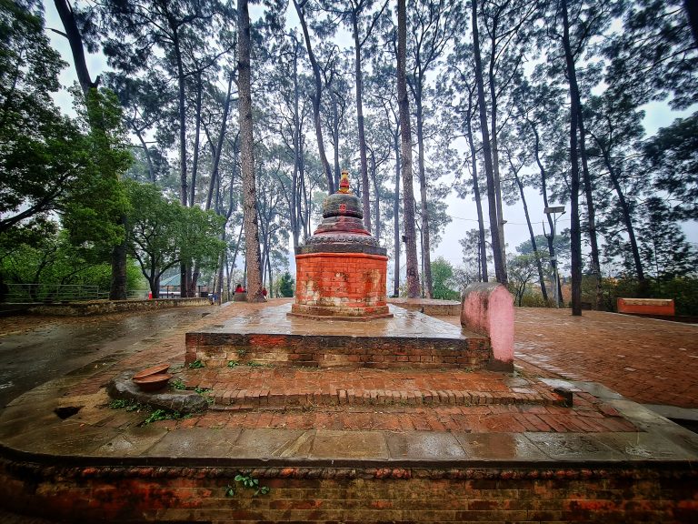 Temple surrounded by trees.