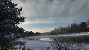 Latvia, Valmiera. River in the winter. Sunny day