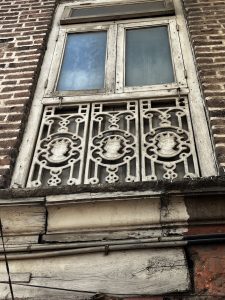  Photo of a very old Window pane from a building in Camp area of Pune, India.
