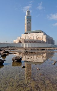 Hassan II mosque and it's reflection in tidal pools, Casablanca, Morocco.