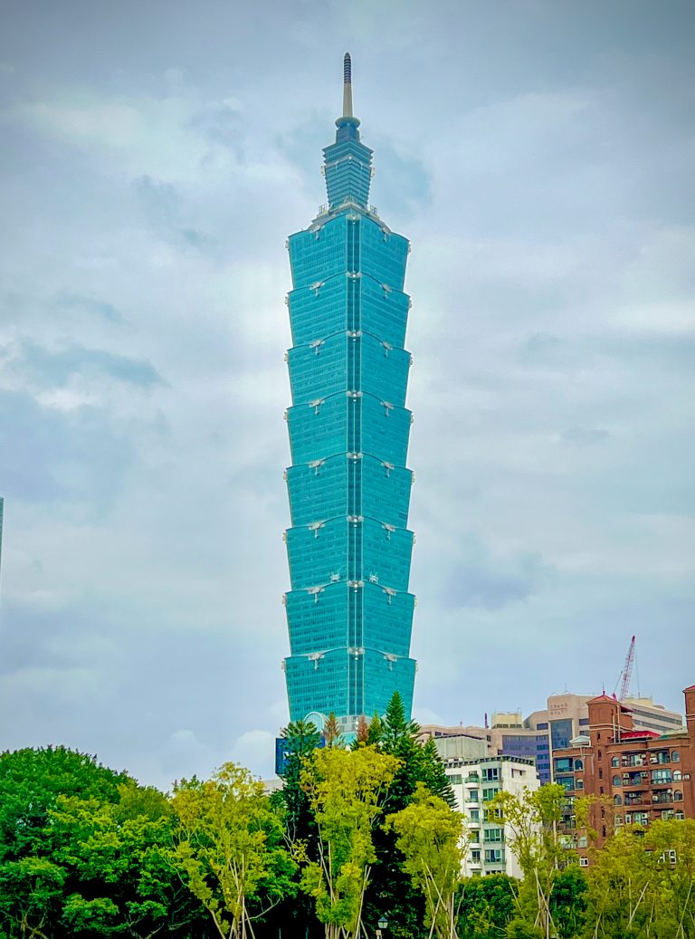 Taipei 101 building rising up from the city. One of the tallest buildings in the world.